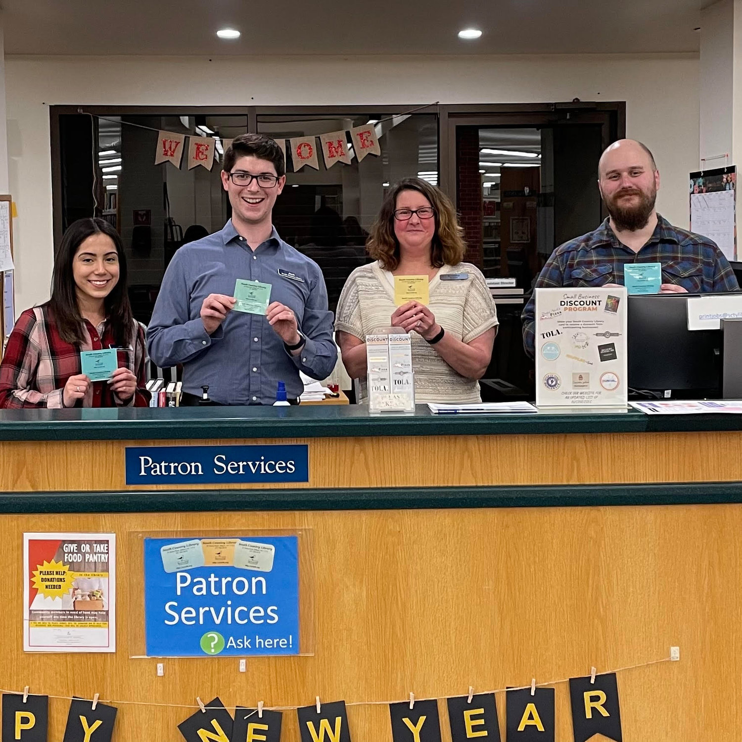 Here are some of the members of the helpful South Country library staff: (left to right) Marcia Bolanos Buestan (patron services), Jack Nix (community engagement librarian), Kristina Sembler (library director), and Joshua Kelvas (patron services).